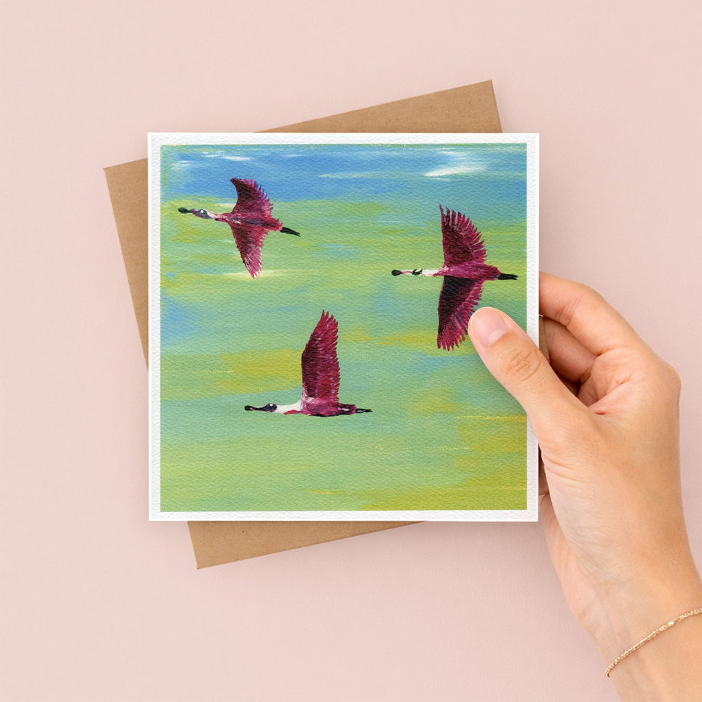 Flying Flamingos Greetings Card