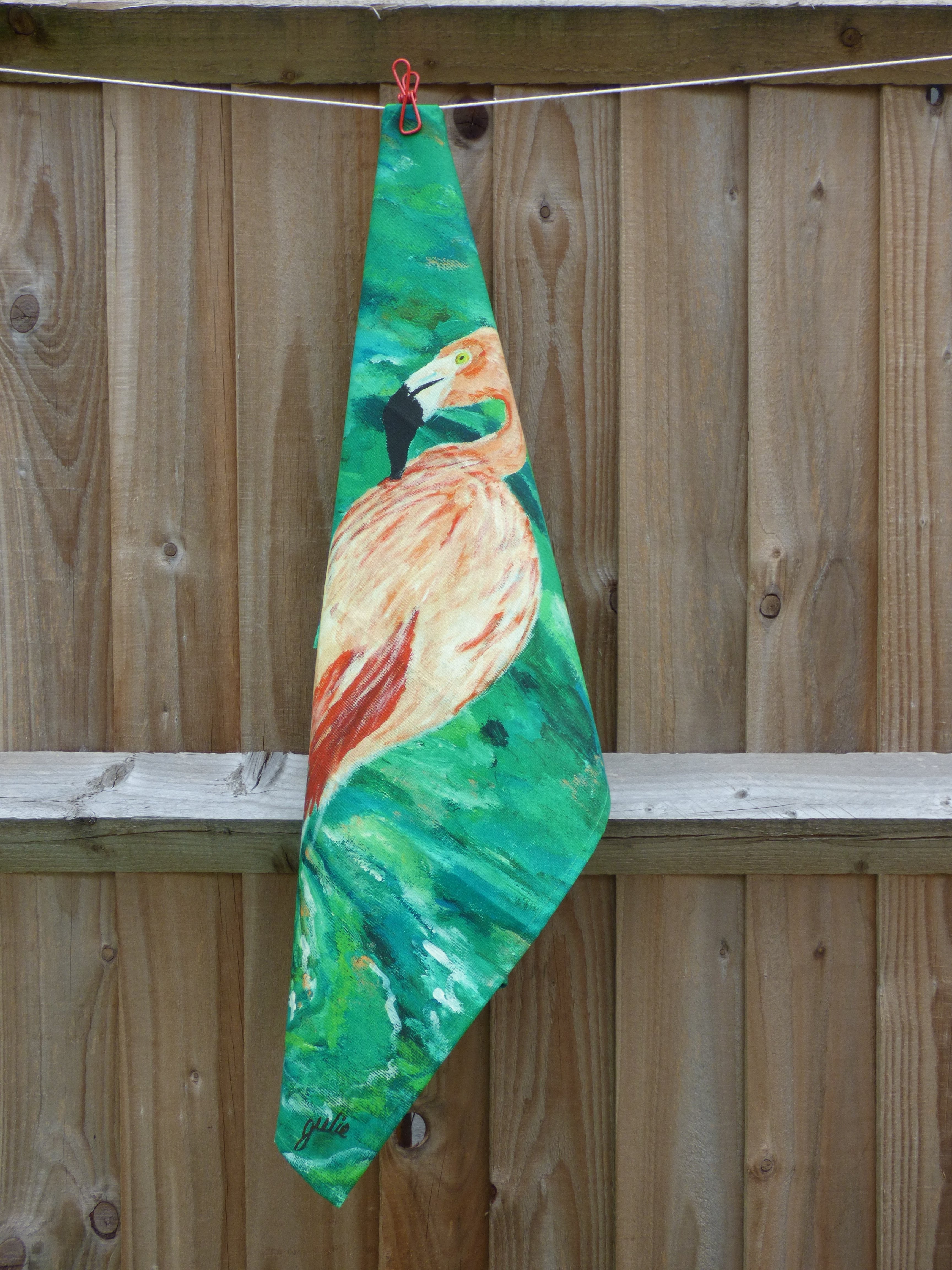 Flamingo XL Tea Towel pinned to a clothes line 